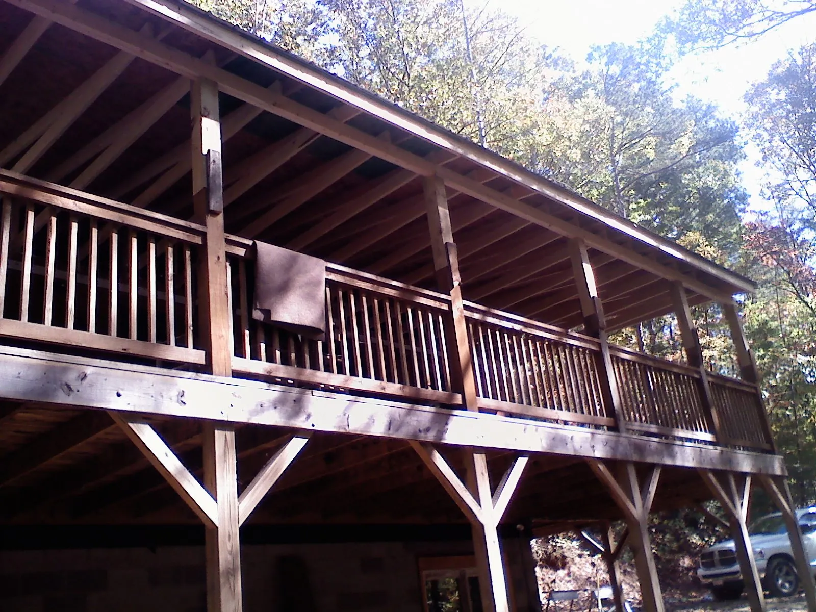 Timber framing under a new elevated porch and deck — Roof Leak Repair in Miramar Beach by Roofing Brothers